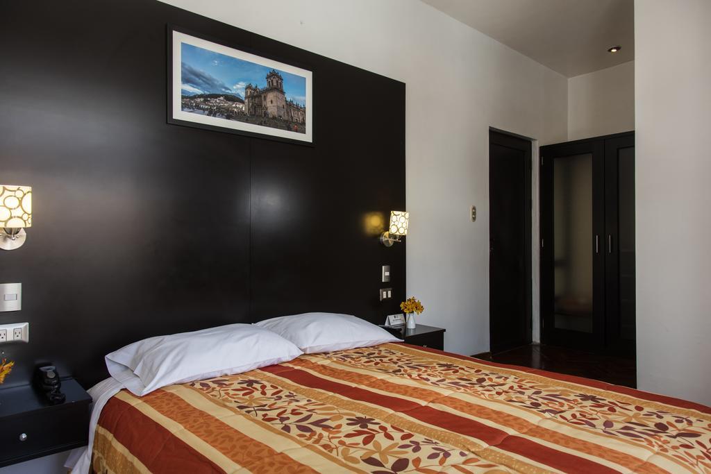 Hostal & Apartments El Triunfo Cusco Exteriör bild