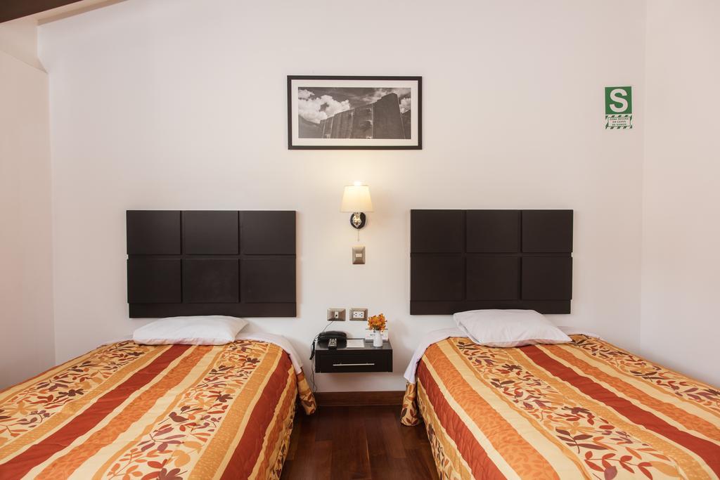 Hostal & Apartments El Triunfo Cusco Exteriör bild